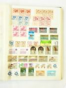 A stockbook containing a quantity of GB and commonwealth stamps including early Victorian,