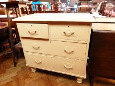 A stained wood jardiniere stand with undershelf,
