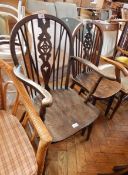 Stained wood Windsor style open armchair