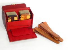 A wooden trumps indicator with scantily clad female, set of Harrods score cards, Bezique game,