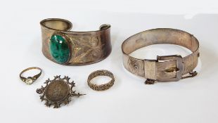 A silver and hardstone bangle set oval green variegated stone, maker EJ Limited,