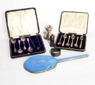 A set of six silver coffee spoons, Sheffield 1935, cased, a set of four silver teaspoons,