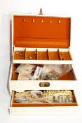 A jewellery box and contents of costume jewellery,