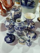 A pair of Chinese porcelain vases with dragon decoration, in underglaze blue,