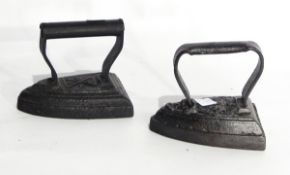 Three boxes of Victorian and later flat irons,