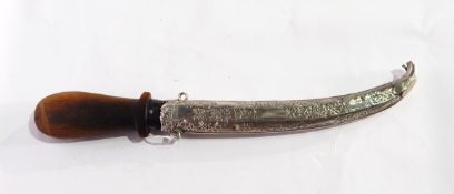 Arabic rhino horn handled knife with foreign silver scabbard, floral and scroll decoration,