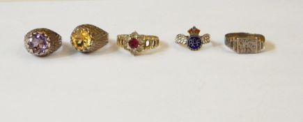 Two modern silver rings of textured design, one set with an amethyst, the other with a citrine,