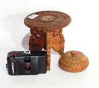 Large carved ebonised elephant and other carved elephants, Indian carved wooden flute,