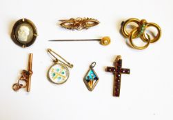 A Victorian 9ct gold bar brooch of scroll design, a Victorian rolled gold shell cameo brooch,