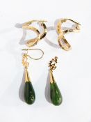 A pair of dark green jade and gold-coloured metal teardrop pendant earrings and a pair of 9ct gold