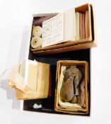 A quantity of gold leaf and white metal leaf in booklets,