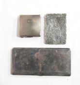 A Victorian silver card case with overall floral engraving, hinged top,