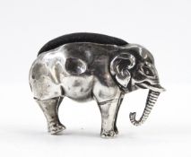 An Edwardian silver novelty pin cushion by Adie & Lovekin Limited, Birmingham (date letter rubbed),