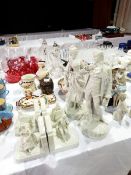 Two pairs of Japanese porcelain bookends with china figures in 18th century style