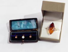 An opal set gold-coloured metal stud, two plain 9ct gold studs,