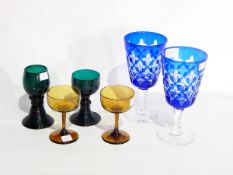 Pair of blue flash cut large stem glasses,