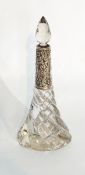 A glass tapering scent bottle with foliate white metal collar and stopper,