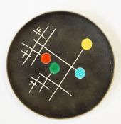 Neveux Vallauris stoneware plate with black ground and contemporary pattern,