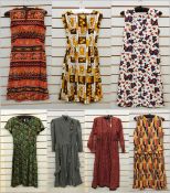 A woollen dress with ruffle details, side buttons, labelled 