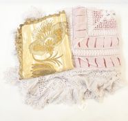 An embroidered table runner,