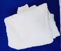 A pair of cotton bedspreads, white bedspreads, assorted table and bed linen,