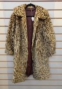 A faux-fur coat printed leopard pattern,