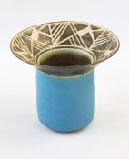 Stoneware vase with brown geometric patterned flared rim with powder blue body, marked 