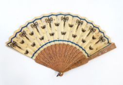 A Chinese wooden brise fan, both guard sticks slightly damaged,