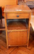 An oak bedside table with frieze drawer, open shelf cupboard below, width 40cm,