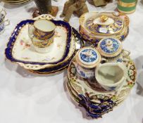 A pair of Coalport dessert plates decorated with sprigs of flowers and a two-handled dish ensuite,