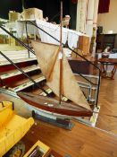 A wooden pond yacht 