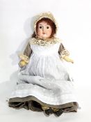 German(?) bisque headed doll, fixed eyes, open mouth, head incised 