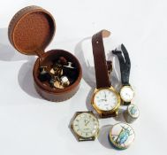 A pair of gold cufflinks with plates of plain oval form with chain links, marked 9ct, approx. 10.