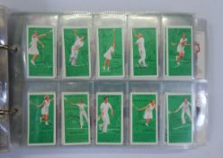 An album of cigarette cards including Players 