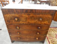 An early 19th century cross banded and inlaid mahogany straight front secretaire with fitted