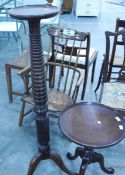 Circular topped occasional table on tripod feet