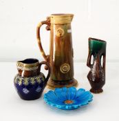 A Royal Doulton stoneware jug with impressed decoration with blue and green glazes,