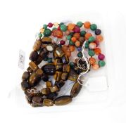 String of graduated beads including lapis, cornelian, jade and crystal,