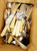 A quantity of silver plated table flatware to include fish knives and forks, etc.