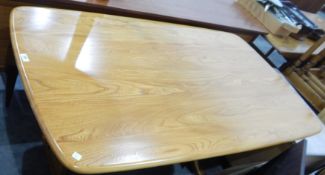 An Ercol style refectory dining table,