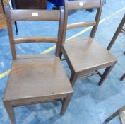 A pair of Georgian-style mahogany solid seat standard chairs