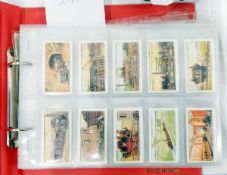 Three albums of various cigarette cards including Wills 