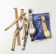 A gold-coloured lady's Rotary battery watch with several different links and extensions (including