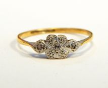 A yellow metal gypsy set dress ring set garnet and an illusionary set dress ring