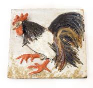 A Colin Kellam studio pottery tile, relief decorated with cockerel, on mottled ground, 25cm x 27.
