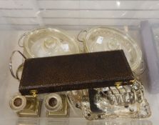 A quantity of silver plate to include a pair of column candlesticks, serving dishes,