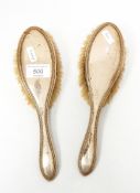 Two silver backed hairbrushes