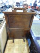 A Victorian bedpost type torchere with shaped tripod supports