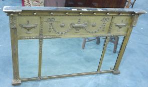 A rectangular gilt Regency style mirror with urn and swag decoration, with 