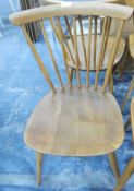 A set of six beech stickback kitchen chairs